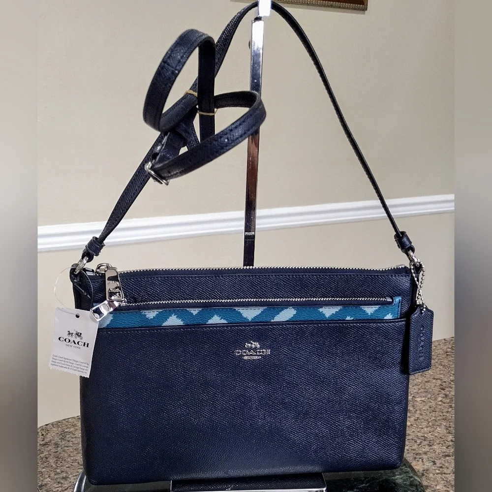 NWT  Coach East/ West Cross body with pop_ Up Pouch Wild plaid print